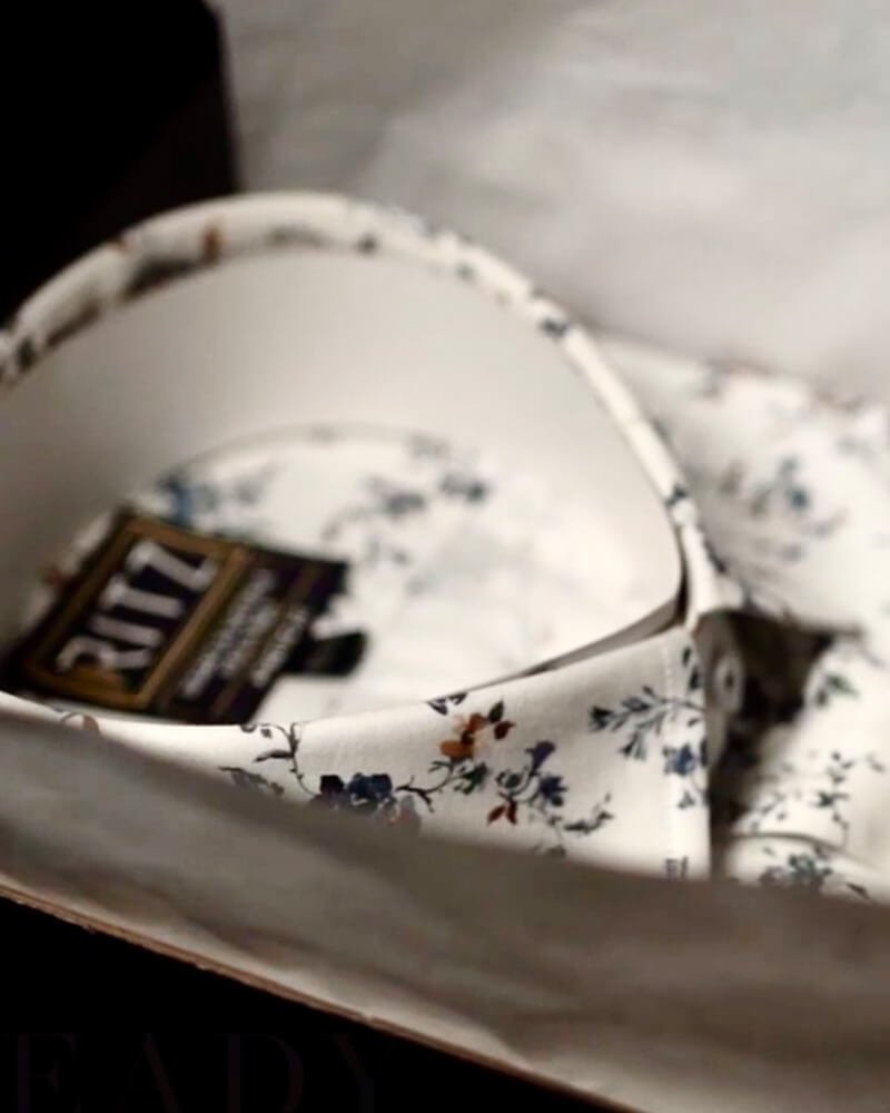 Detail of a Ritz The Label shirt collar and brand tag