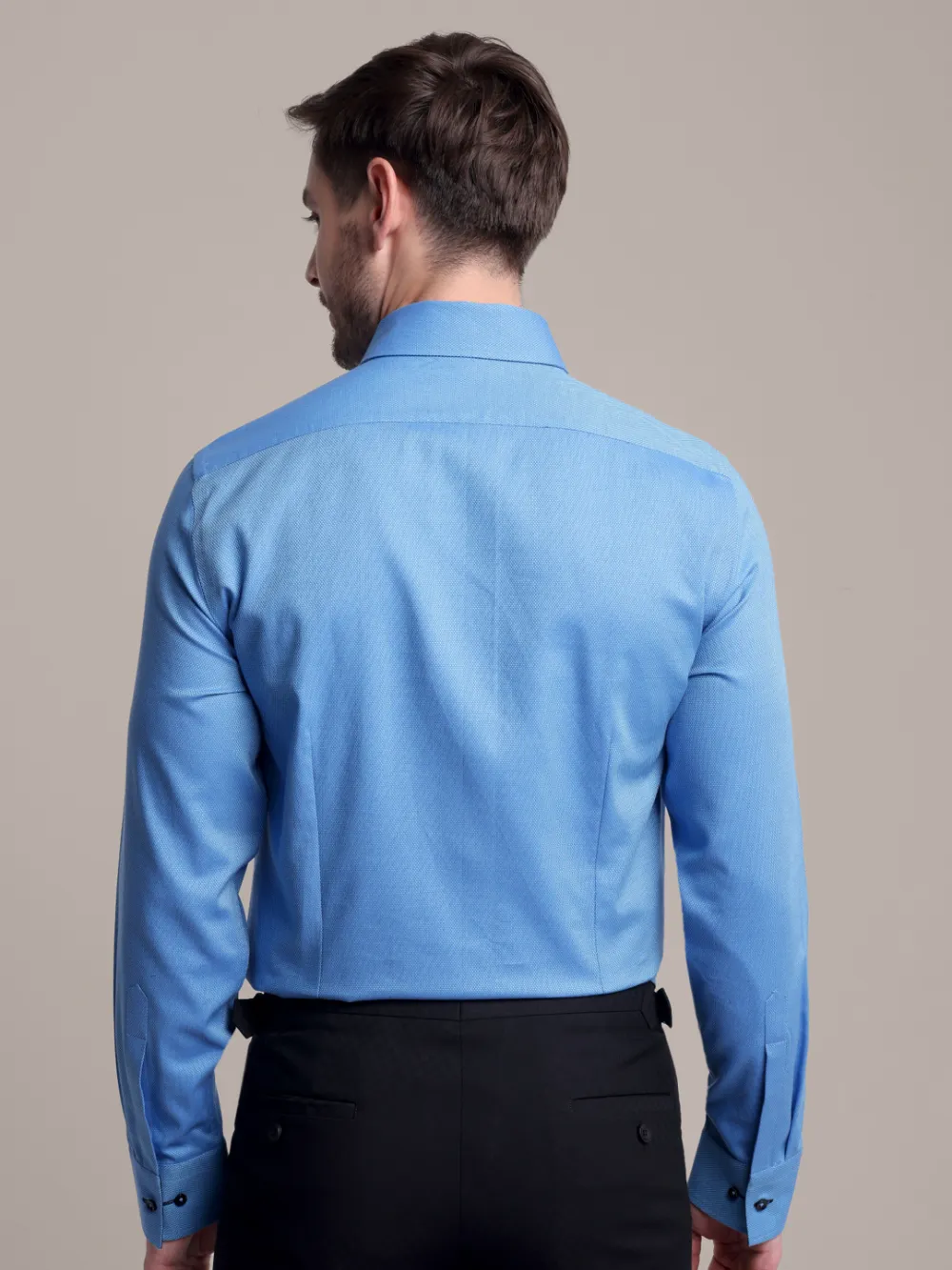 Topaz designer pair of plain turquoise shirt and black trousers